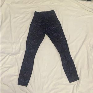 Black and purple dotted leggings